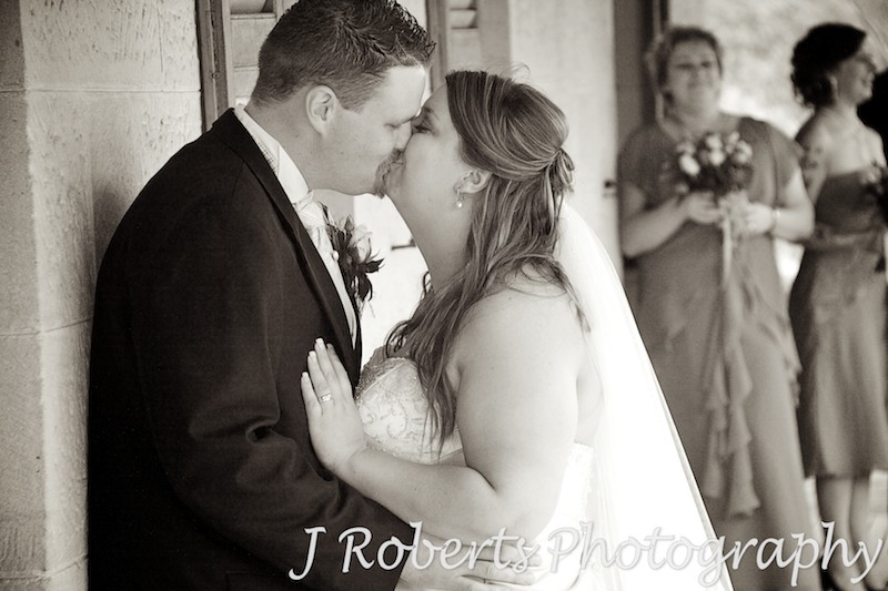Sepia of bride and groom kissing - wedding photography sydney